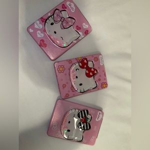 Hello Kitty pocket mirrors. 3 different styles
